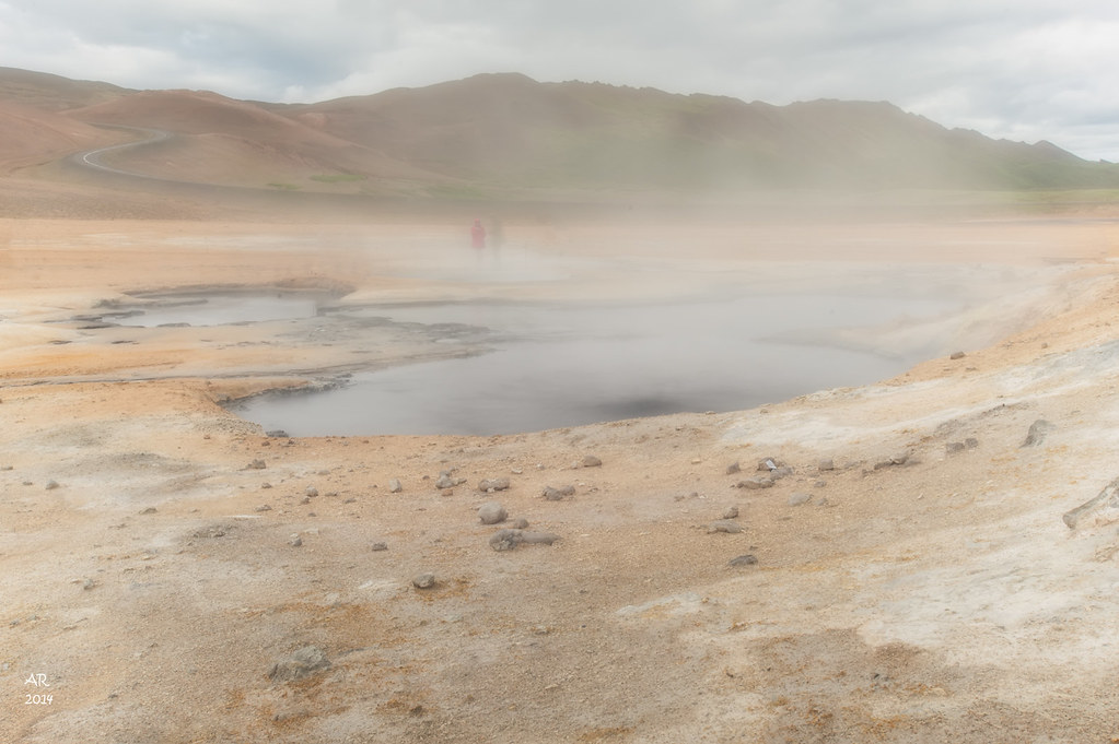 A simple geothermal landscape at Namafjall in Iceland shows mineral earth and soft steam