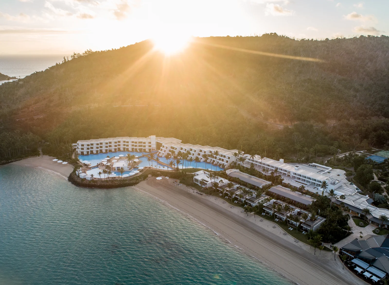 Aerial view of InterContinental Hayman Island Resort surrounded by blue water