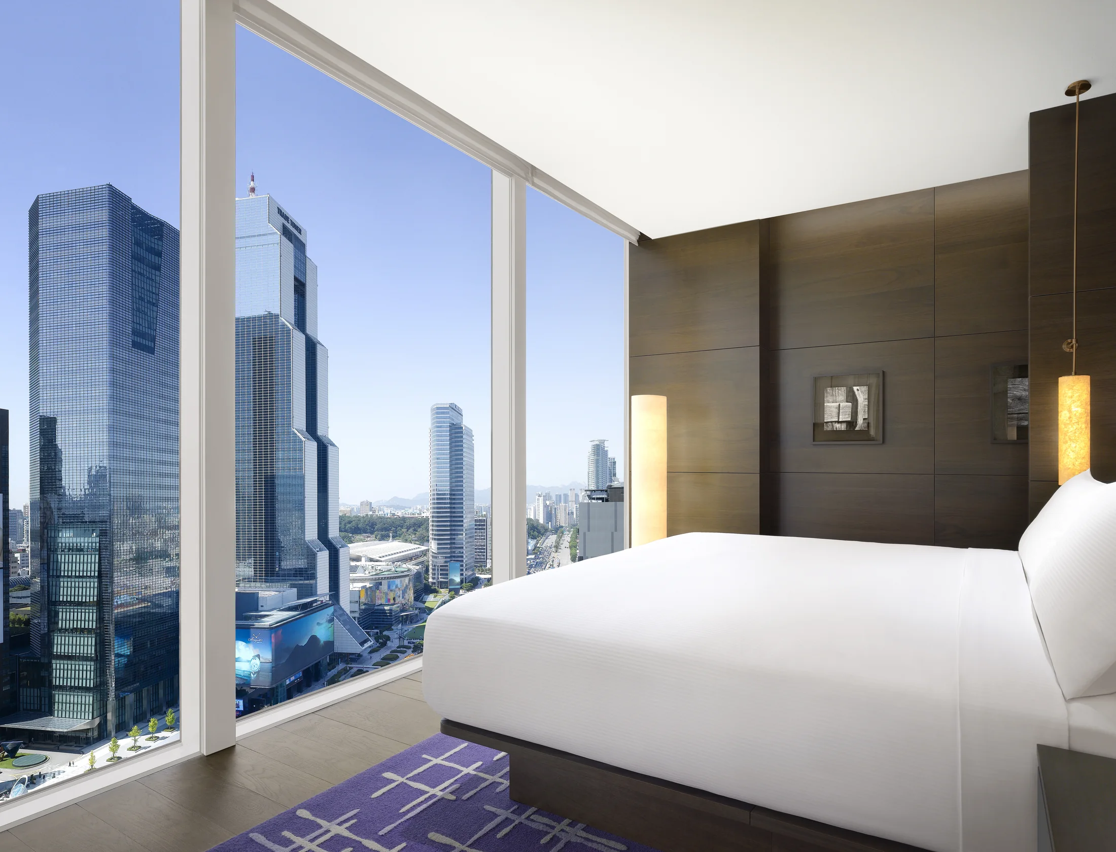 Park Suite King Deluxe bedroom at Park Hyatt Seoul with floor-to-ceiling views across Gangnam